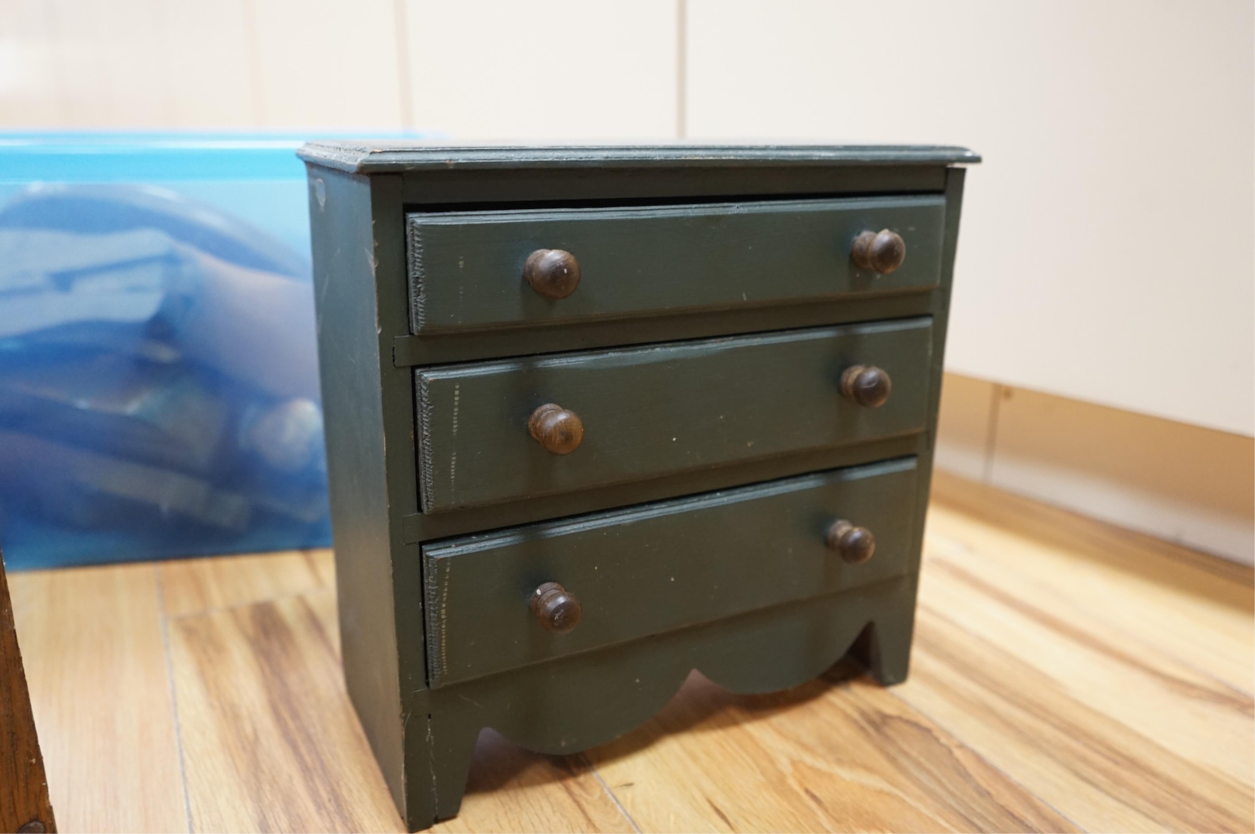 A painted pine miniature chest of drawers, various boot trees etc, chest 26cm x 26cm